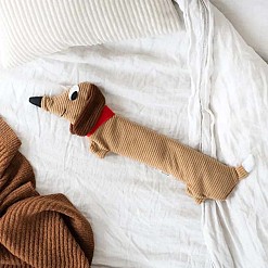 Almofada de aquecimento com a forma de um dachshund