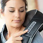 Com três intensidades de massagem e efeito de calor