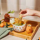 Conjunto de chá matcha com capivara