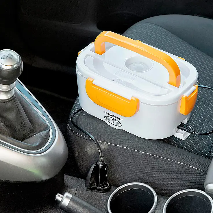 Liga-se à tomada de isqueiro do automóvel (cabo USB incluído) para aquecer os alimentos