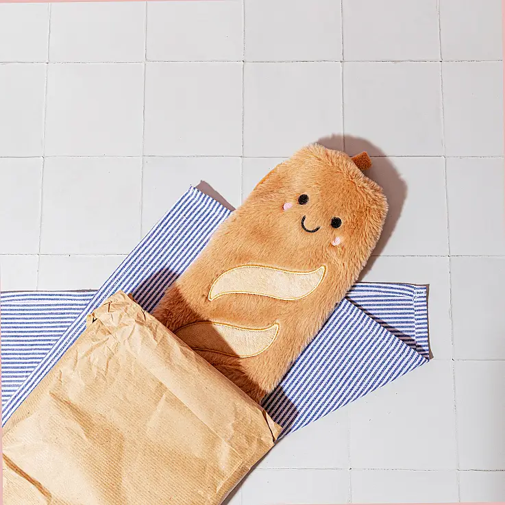 Garrafa de água quente em forma de baguete