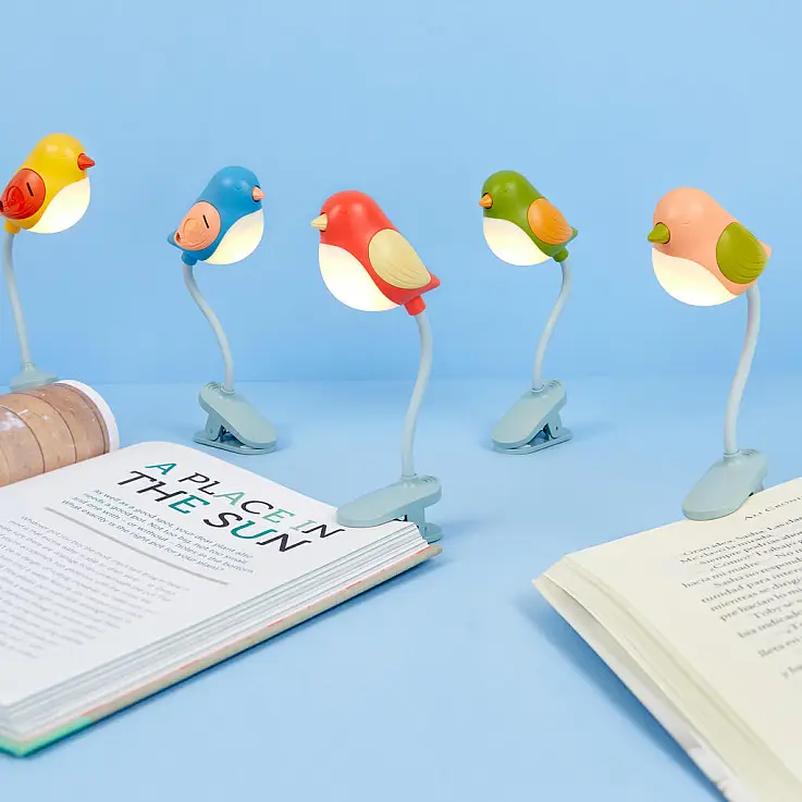 Luz de leitura em forma de pássaro